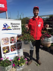 Seth and flowers at 2019 hanging basket sale.