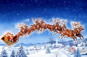 santa in his sleigh with reindeer.
