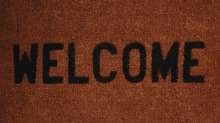 welcome mat image on newcomers to Canada page, new Canadians page. 